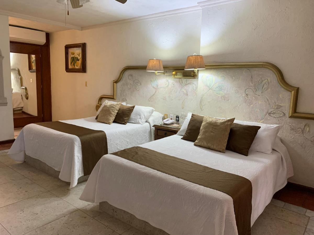 Hotel Inn Galerias Aguascalientes Quarto foto